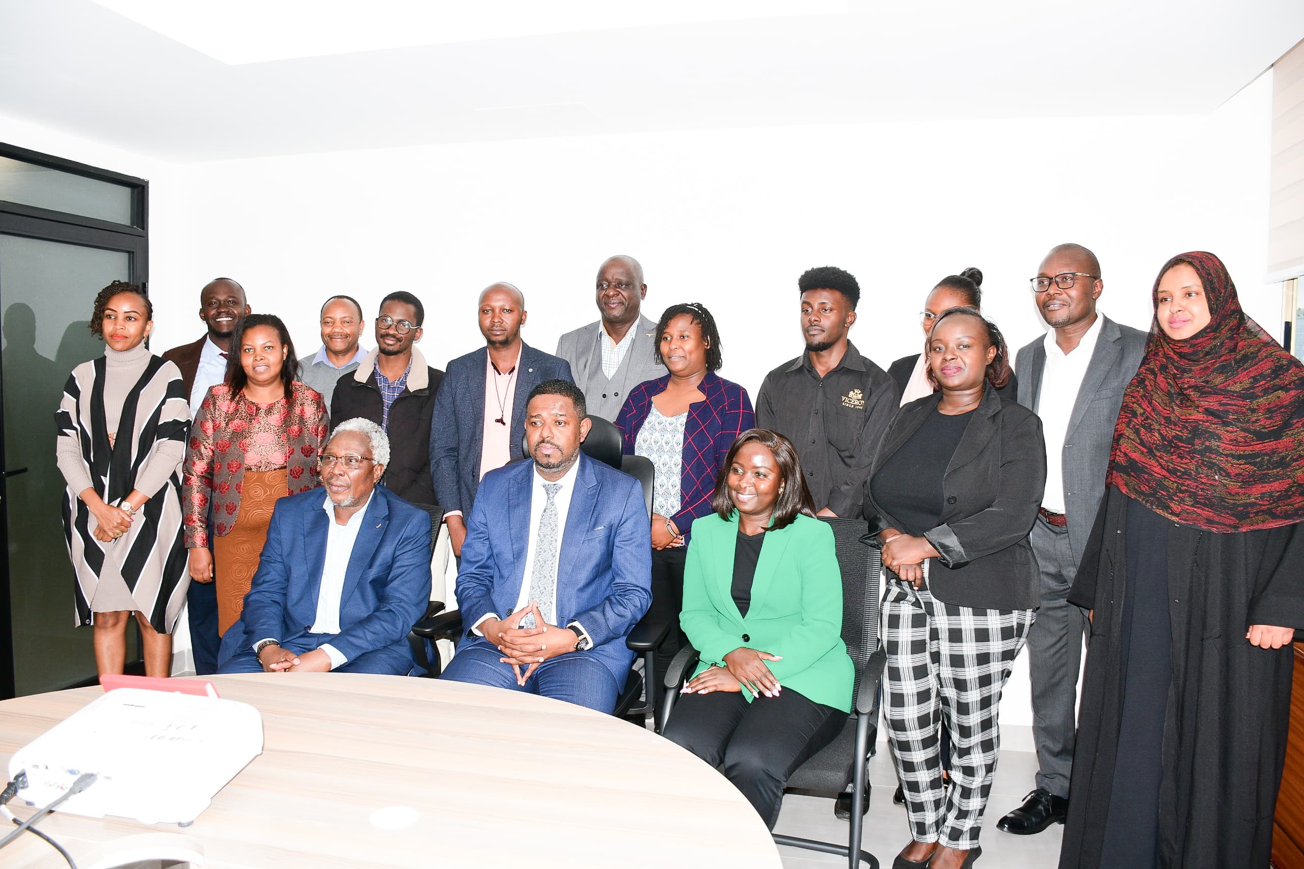 Principal Secretary for Investment Promotion, Abubakar Hassan Abubakar, alongside KJET’S Communications Specialists Kibisu Kbatesi, EBS (seated to his left) and Carren Chelagat (seated to his right), during the 4th High-Level Consultative Session of Communications Heads 