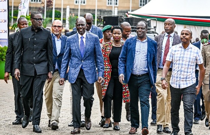 H.E the President Dr. William Ruto, MSEA Board Chairman Mr. James Mureu and other dignitaries interacting with KJET beneficiaries during the ceremony