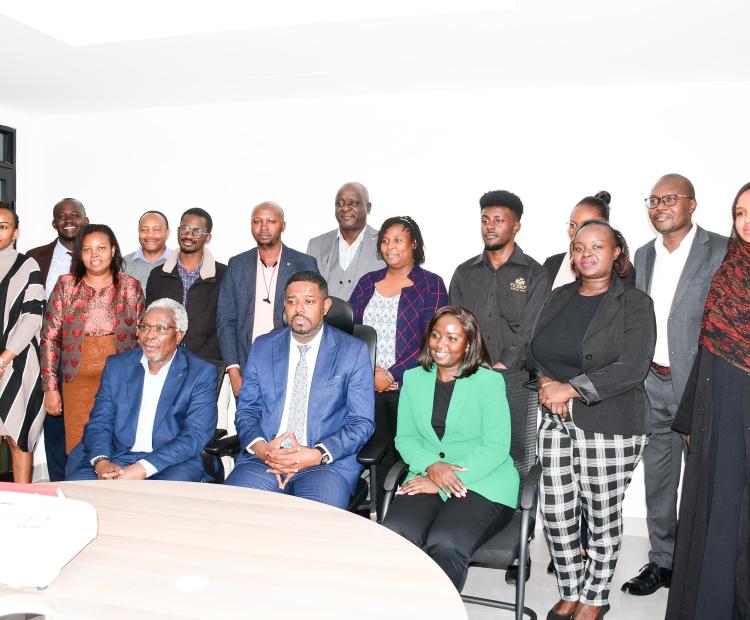 Principal Secretary for Investment Promotion, Abubakar Hassan Abubakar, alongside KJET’S Communications Specialists Kibisu Kbatesi, EBS (seated to his left) and Carren Chelagat (seated to his right), during the 4th High-Level Consultative Session of Communications Heads 